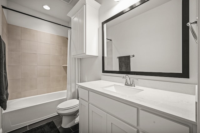 full bathroom with toilet, visible vents, shower / bath combo with shower curtain, and vanity