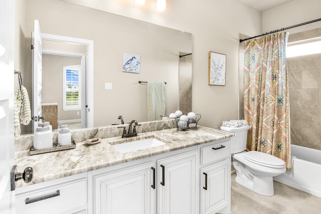 full bathroom featuring shower / tub combo with curtain, vanity, and toilet