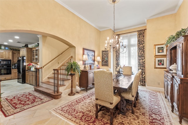 dining area with arched walkways, a notable chandelier, baseboards, stairway, and crown molding