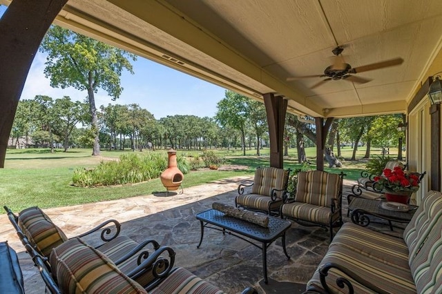 view of patio / terrace with ceiling fan and outdoor lounge area