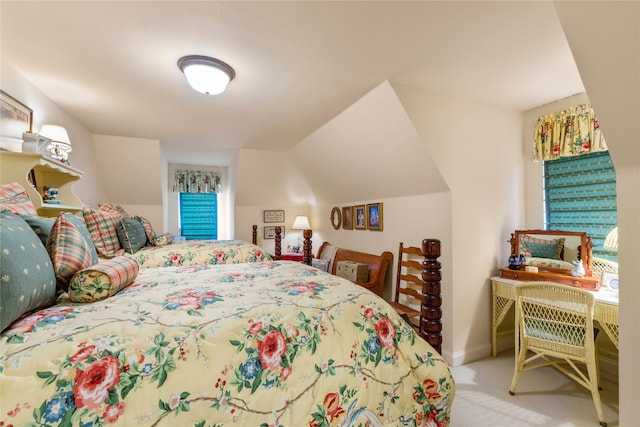 bedroom featuring carpet floors and baseboards