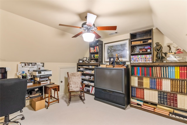 office area with visible vents, vaulted ceiling, and a ceiling fan