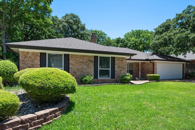 1803 Burr Oak St, Arlington, TX 76012 - ranch-style house with an attached garage, a front lawn, a chimney, and brick siding