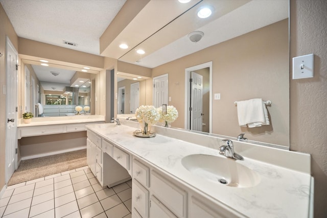 1803 Burr Oak St, Arlington, TX 76012 - full bathroom featuring double vanity, tile patterned flooring, baseboards, and recessed lighting