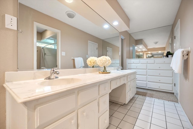 1803 Burr Oak St, Arlington, TX 76012 - full bathroom featuring double vanity, tile patterned flooring, and recessed lighting