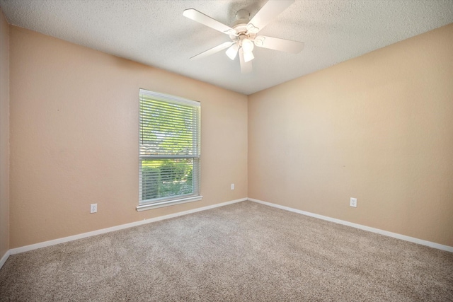 1803 Burr Oak St, Arlington, TX 76012 - carpeted spare room featuring a textured ceiling, a ceiling fan, and baseboards