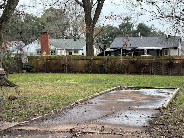 view of yard featuring a fenced backyard