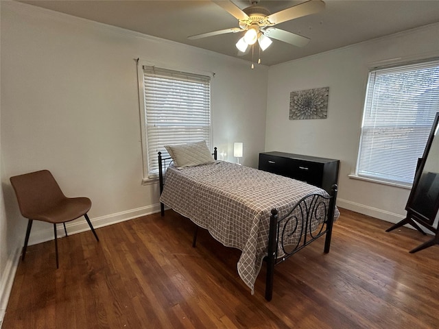 bedroom with dark wood-style floors, baseboards, and a ceiling fan