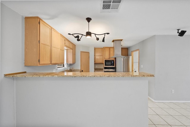 kitchen with island range hood, stainless steel appliances, a peninsula, a sink, and visible vents