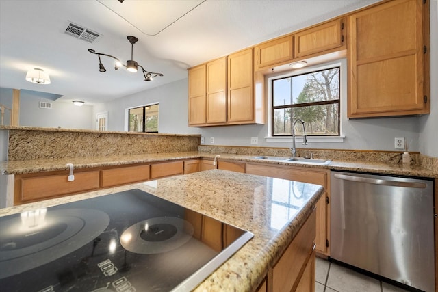 kitchen with black electric stovetop, a sink, visible vents, a healthy amount of sunlight, and dishwasher