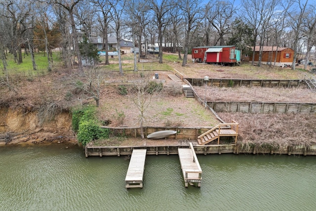 dock area featuring a water view and stairs