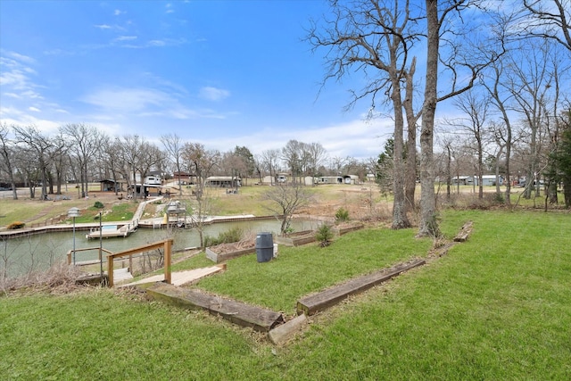 149 Lakeview Dr, Streetman, TX 75859 - view of yard with a water view and a vegetable garden