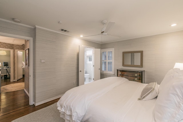 bedroom with recessed lighting, dark wood-style flooring, visible vents, ornamental molding, and wallpapered walls