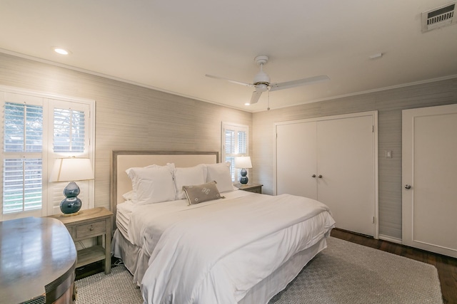 bedroom featuring ornamental molding, multiple windows, visible vents, and recessed lighting