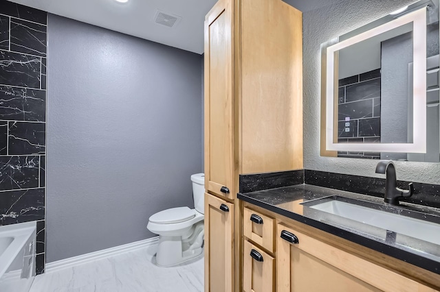 full bathroom with toilet, vanity, visible vents, marble finish floor, and a bath