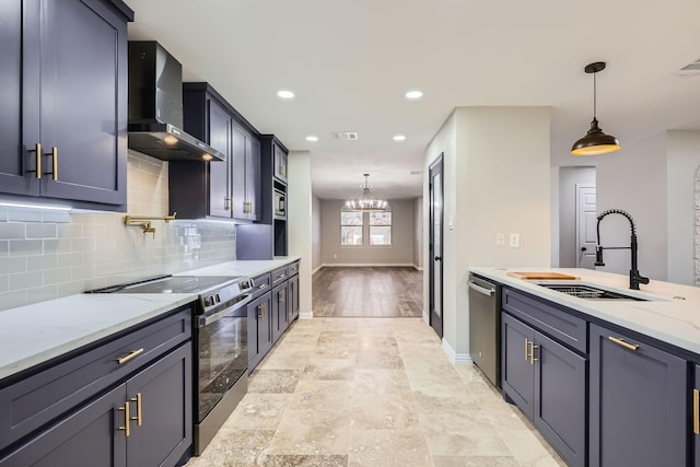 kitchen featuring decorative backsplash, light stone counters, wall chimney range hood, a sink, and range with electric stovetop