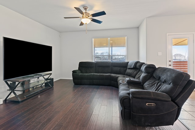 living room featuring plenty of natural light, ceiling fan, and wood finished floors