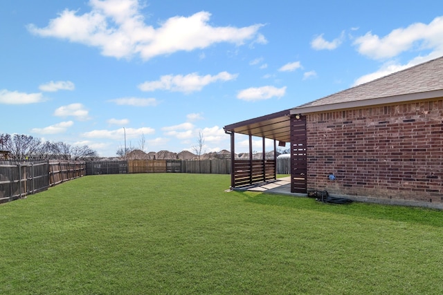 view of yard featuring a fenced backyard