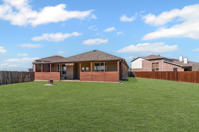 rear view of property with roof with shingles