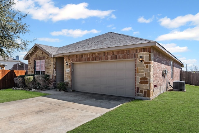 ranch-style house featuring brick siding, fence, concrete driveway, stone siding, and a front yard