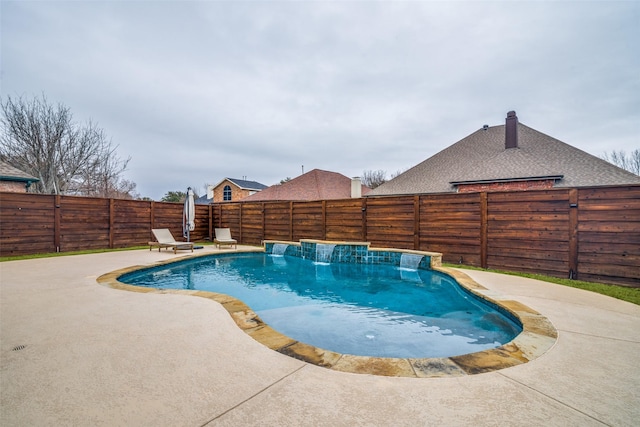 view of swimming pool with a fenced backyard, a fenced in pool, and a patio