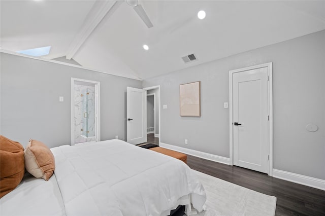 bedroom featuring vaulted ceiling with skylight, dark wood-type flooring, a ceiling fan, visible vents, and baseboards