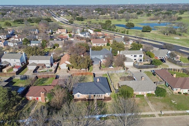 aerial view featuring a water view and a residential view