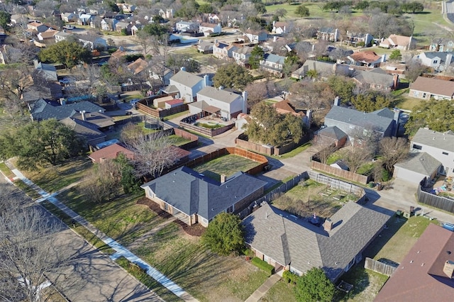 birds eye view of property with a residential view