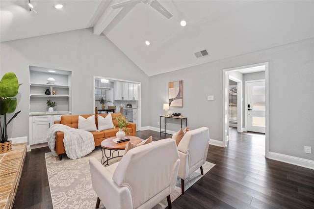 living area featuring visible vents, dark wood-type flooring, high vaulted ceiling, beamed ceiling, and baseboards