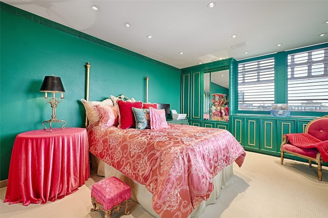 bedroom featuring multiple windows, visible vents, carpet flooring, and recessed lighting