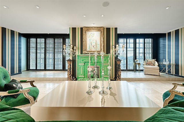 tiled living area with expansive windows, recessed lighting, and wallpapered walls