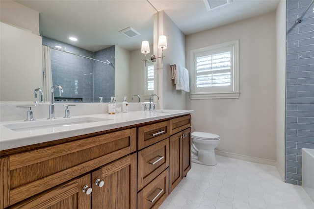 full bath with visible vents, a sink, and tiled shower