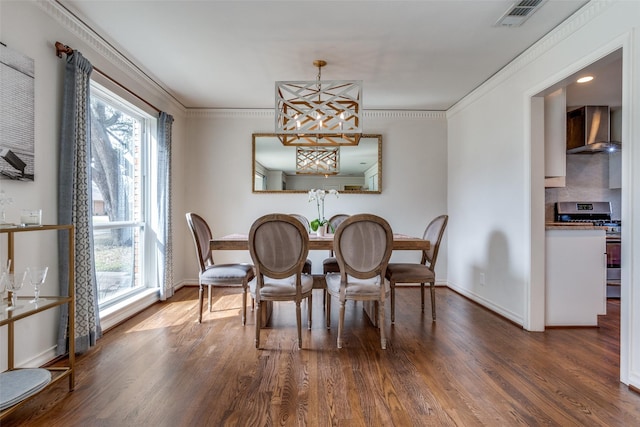 dining area featuring dark wood-style flooring, visible vents, and a healthy amount of sunlight