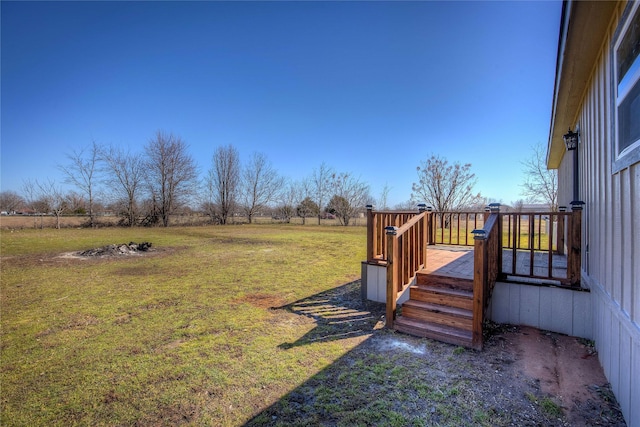 view of yard featuring a wooden deck