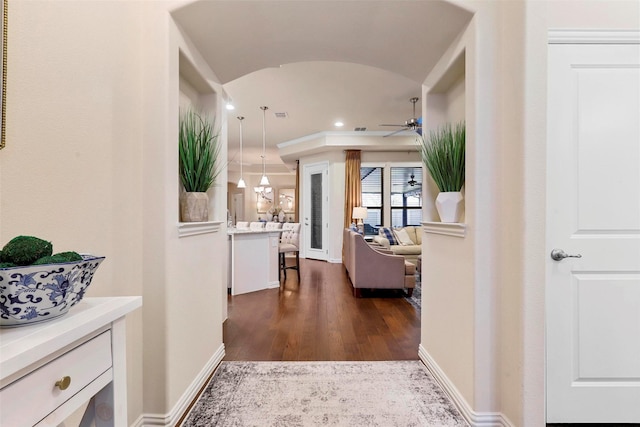 corridor with recessed lighting, dark wood-style flooring, visible vents, and baseboards