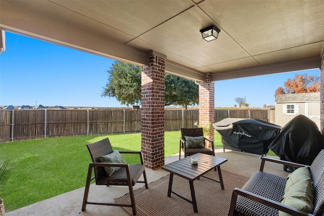 view of patio featuring a grill
