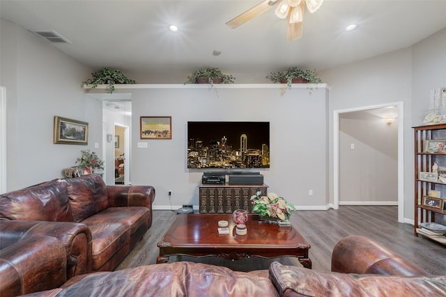 living room featuring baseboards, visible vents, a ceiling fan, wood finished floors, and recessed lighting