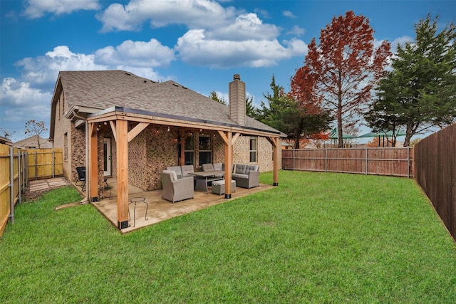 view of yard featuring an outdoor hangout area, a patio area, and a fenced backyard