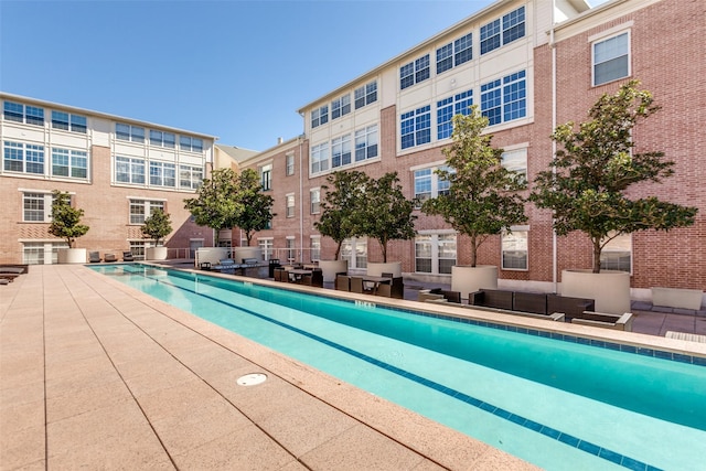 pool with a patio area