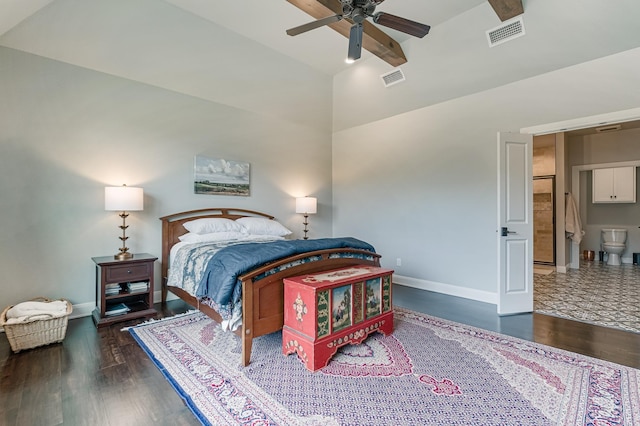 bedroom featuring baseboards, beam ceiling, visible vents, and wood finished floors