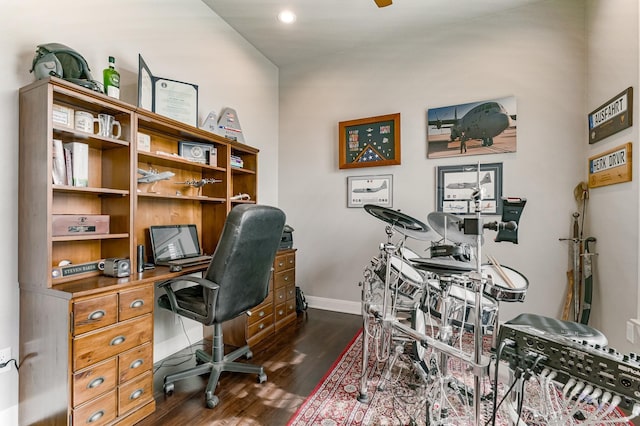 office featuring ceiling fan, baseboards, and dark wood-style flooring