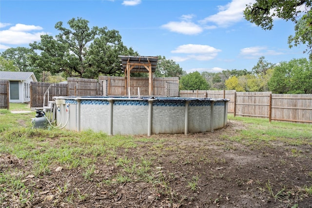 view of pool featuring a fenced in pool and a fenced backyard