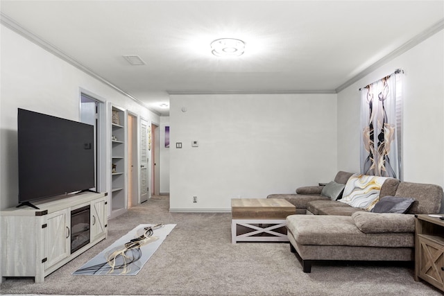 living area with baseboards, ornamental molding, built in features, and light colored carpet