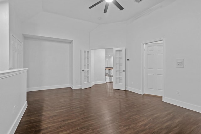 interior space featuring french doors, lofted ceiling, ceiling fan, wood finished floors, and baseboards