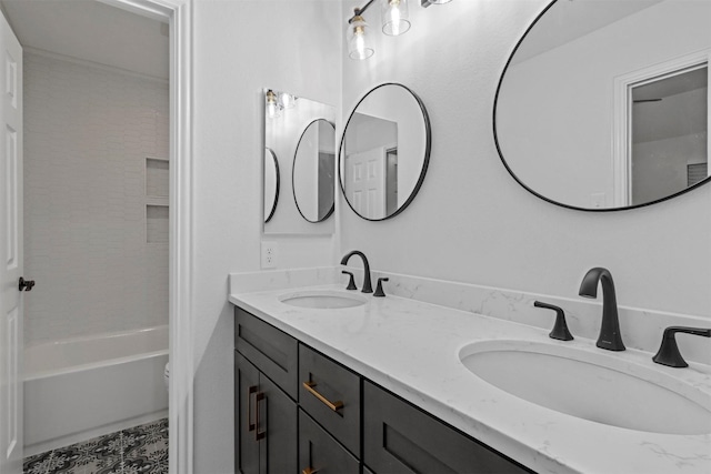 full bathroom featuring double vanity, a sink, and bathing tub / shower combination