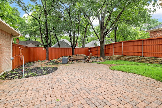 view of patio featuring a fenced backyard