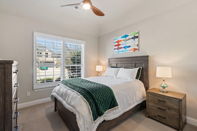 bedroom featuring carpet, baseboards, visible vents, and ceiling fan