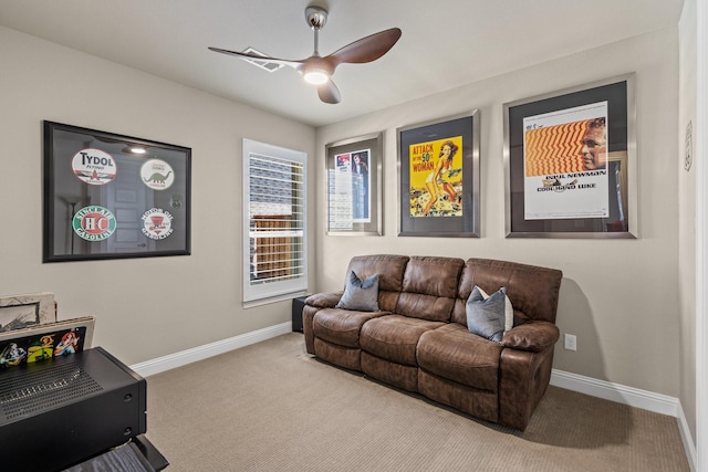 interior space featuring ceiling fan and baseboards