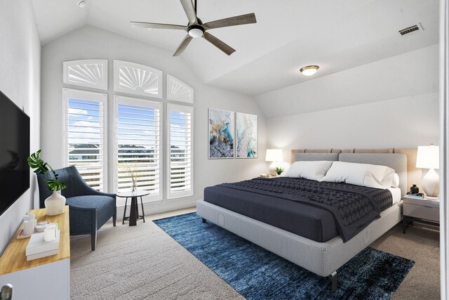 bedroom featuring lofted ceiling, a ceiling fan, visible vents, and carpet floors