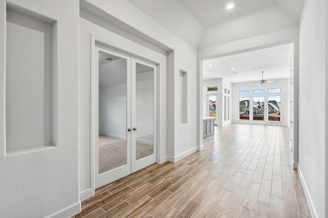 hall featuring recessed lighting, french doors, baseboards, and wood finish floors